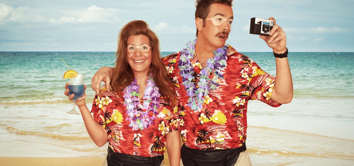 A sunburnt couple of tourists at the beach